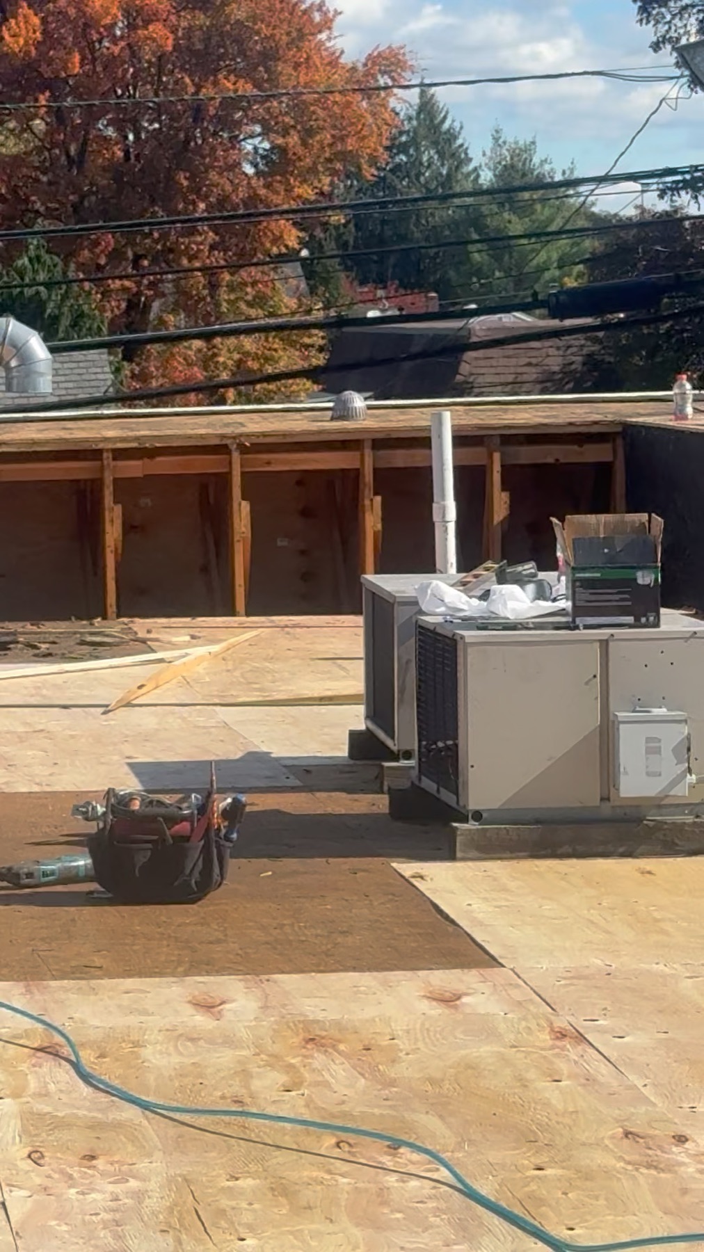 Reliant crew framing a roof in preparation for solar install