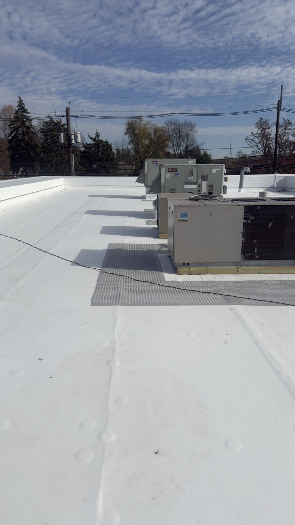 Commercial roof installation by Reliant Solar