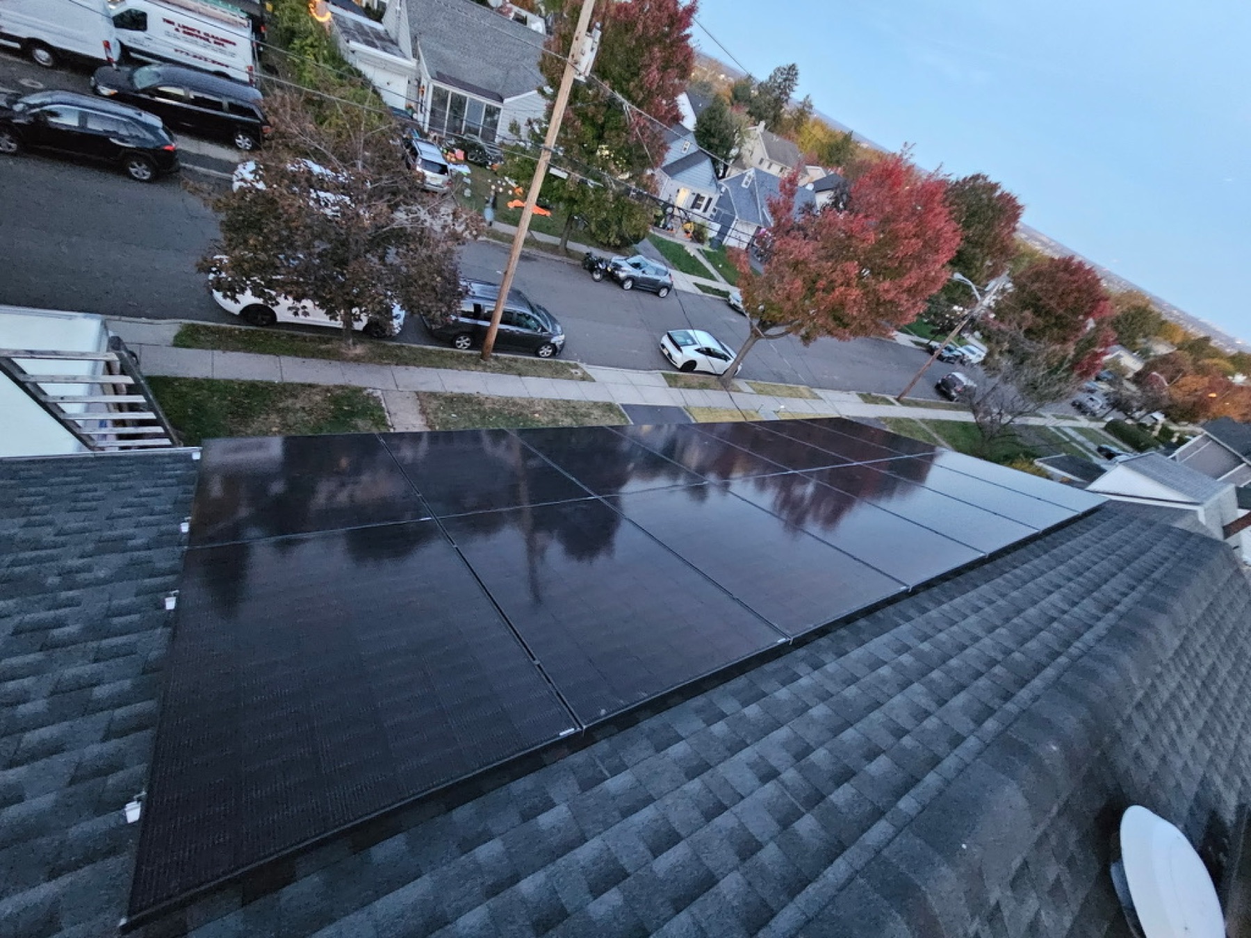 Twilight aerial of a Reliant Solar residential rooftop install