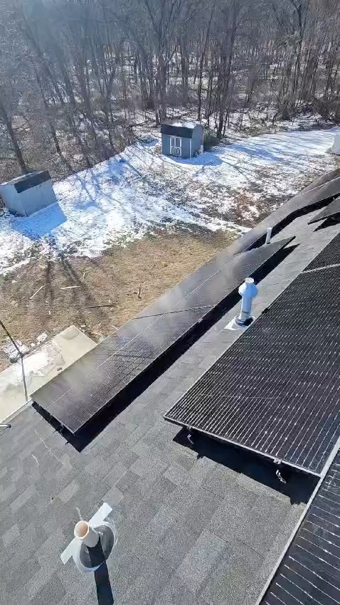 Residential rooftop solar install captured in winter